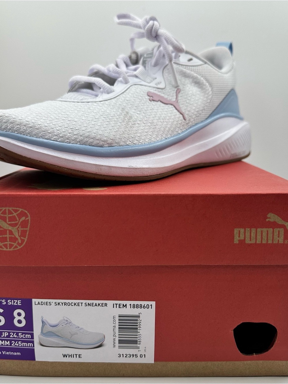 Puma Women's White Sneakers with Light Blue and Pink Accents